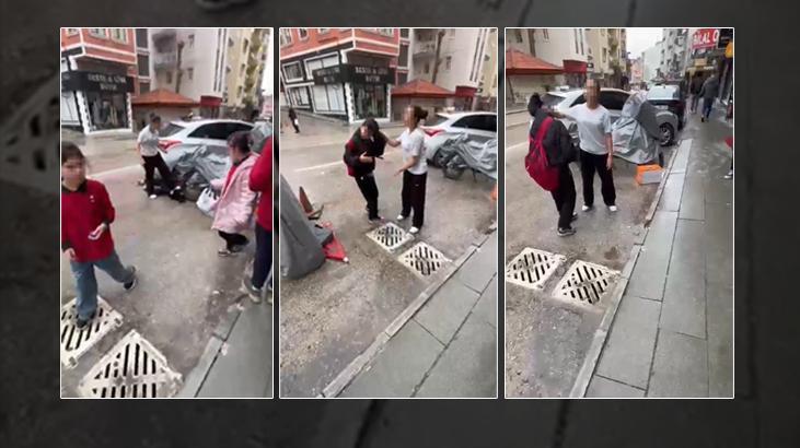 Ortaokul öğrencilerinin kavgası dehşete düşürdü! Saçından tutup yere yatırdı, kafasına ayağıyla bastı